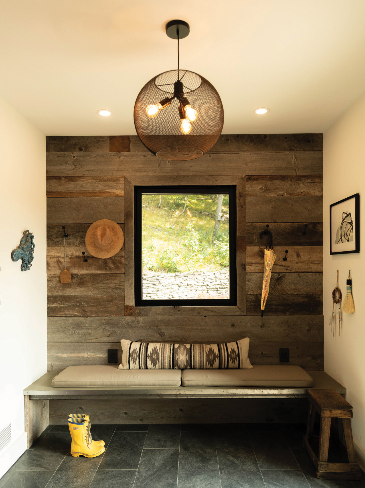 Sitting area with a window in the modern Woodstock farmhouse
