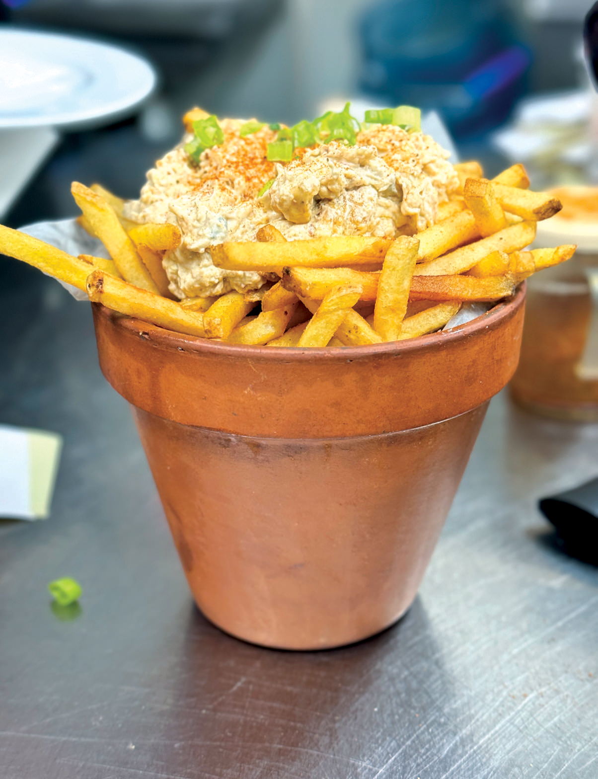 Home Grown Cafè’s clever flowerpots cradle fries with crab fondue and Old Bay.
