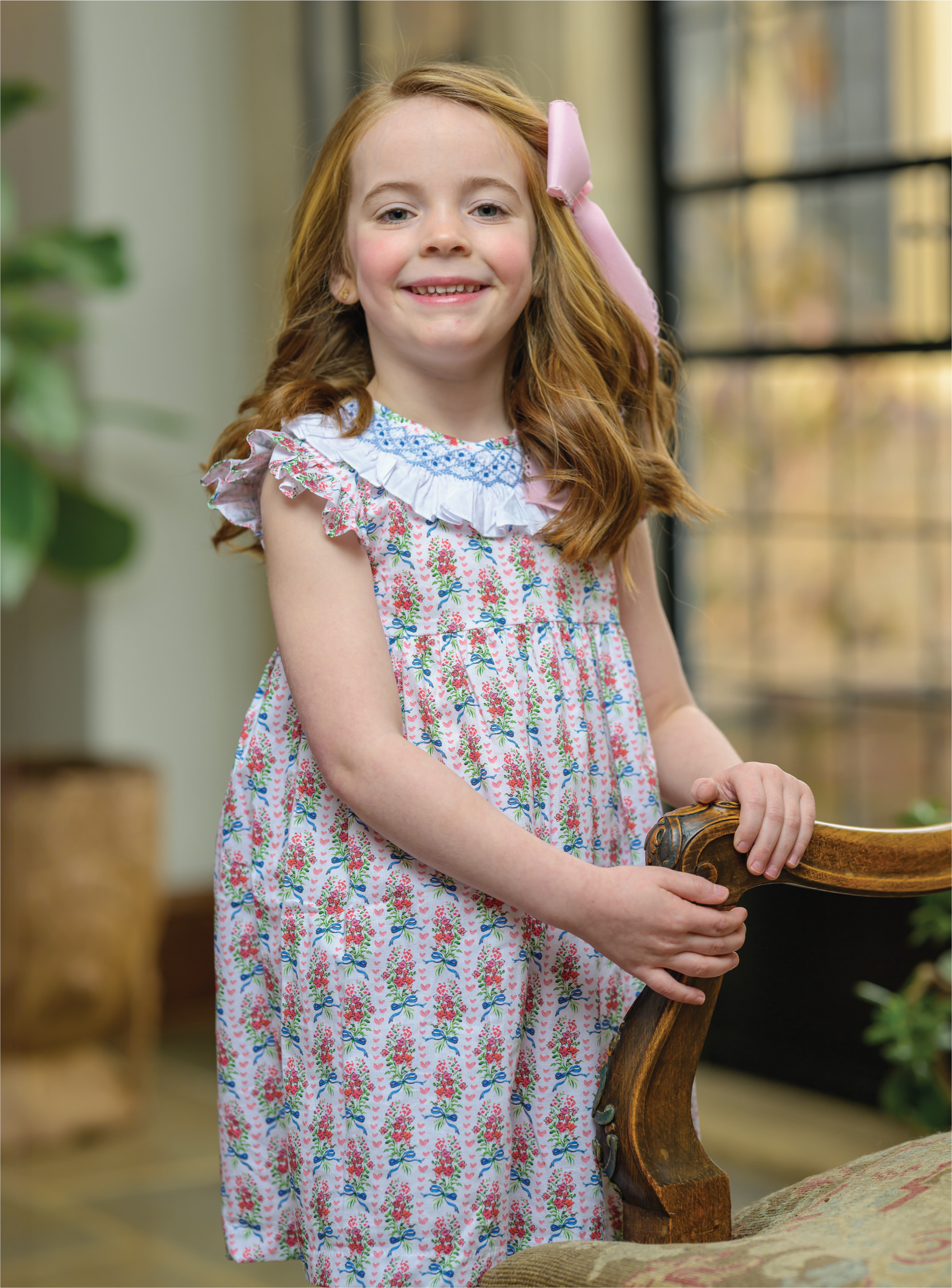 Luli & Me Heart Bouquet dress ($68) and Wee One bow ($16) from the Blue Béret.